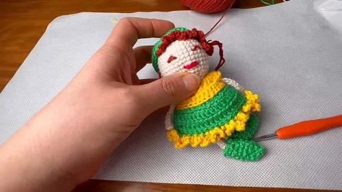 Crochet amigurumi doll with dress, shoes, and hat — photo 2